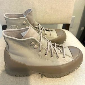 Brand New high boot Converse tan color size 7.5 never worn and comfortable .